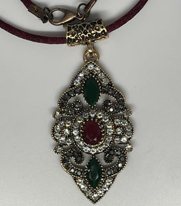 Pendant necklace with burgundy silky rope