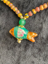 Cargar imagen en el visor de la galería, Strand Necklace with mixed material, fish shaped pendant