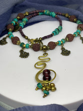 Load image into Gallery viewer, Strand Necklace with mixed materials and spiral pendant