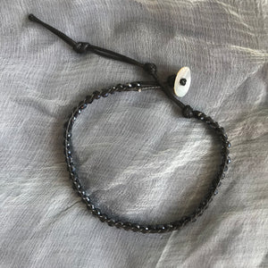 Unisex -Thin dark gray bead bracelet  for her or him. Bracelet is 2 mm thick.