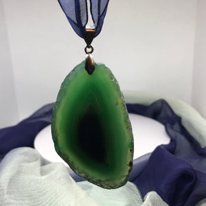 Vintage Greenstone pendant necklace (dark blue transparent rope length 17.5 inches)