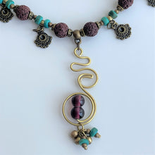 Load image into Gallery viewer, Strand Necklace with mixed materials and spiral pendant